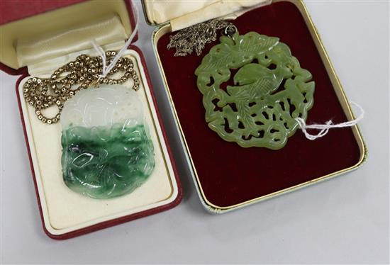 Two carved and pierced jade pendants,